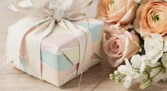 Thoughtful personalized birthday gift box with custom jewelry and flowers